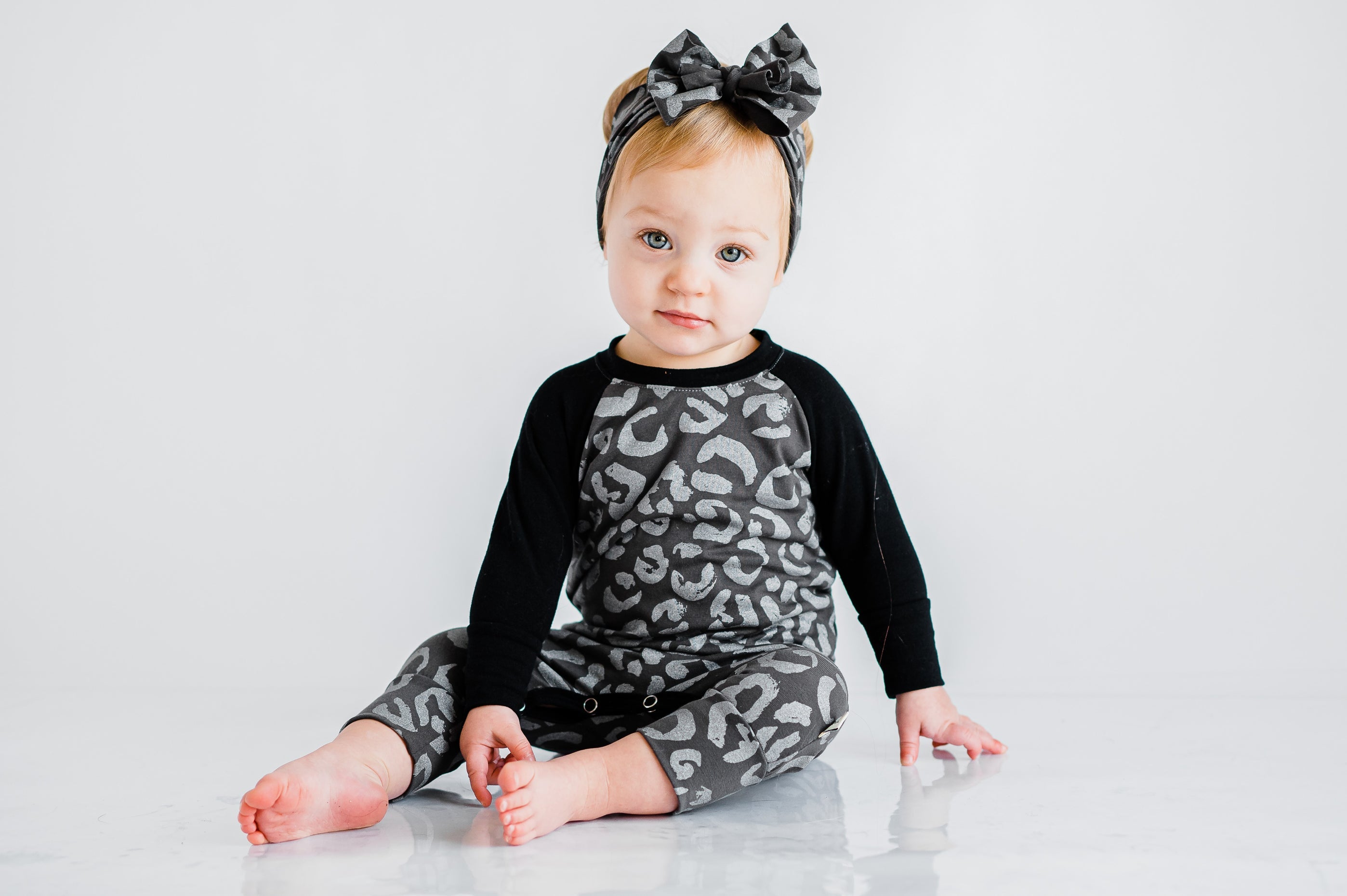 Snowy Leopard Casey Baby Romper