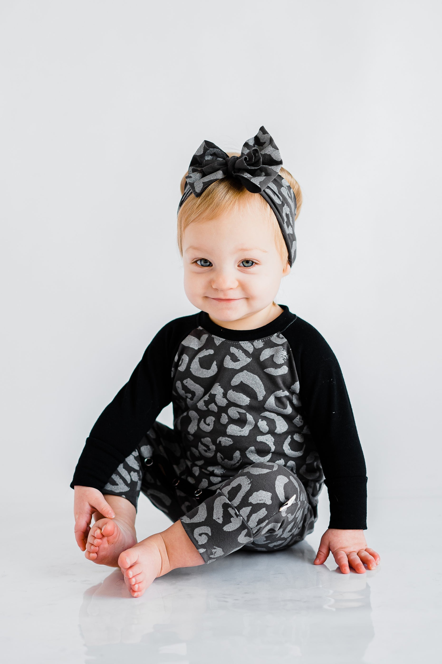 Snowy Leopard Casey Baby Romper